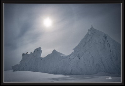 Inuit hunter on iceberg